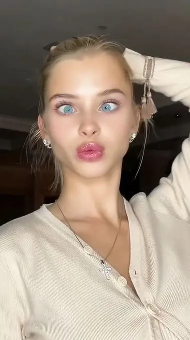 Bruletova Russian Cutie girl doing squinting ahegao face
